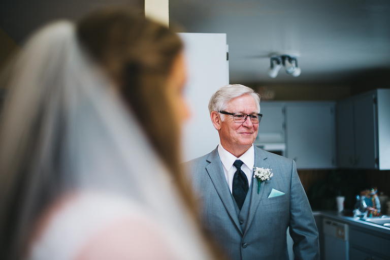 father of the bride seeing her in dress for the first time