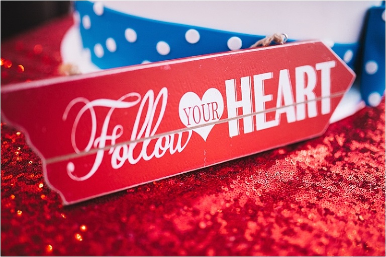 follow your heart red sign decor wedding