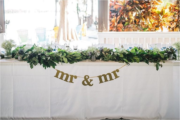 mr & mr wedding sign at paradise cove reception sweetheart table