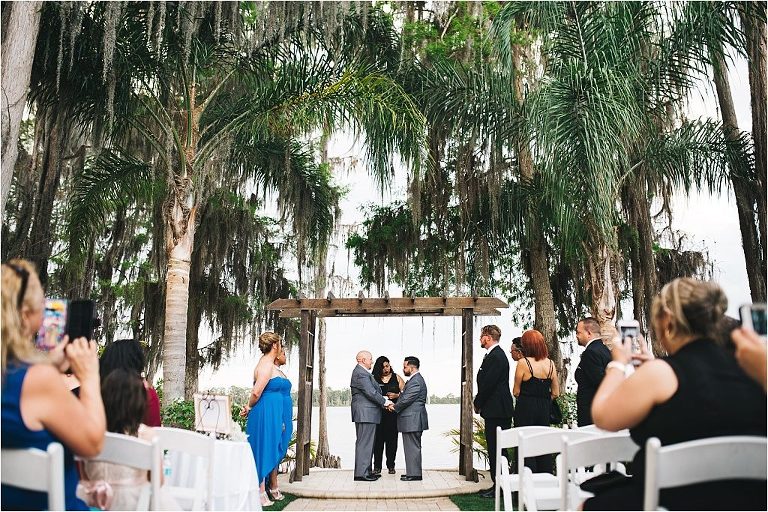 groom and groom getting married at paradise cove orlando