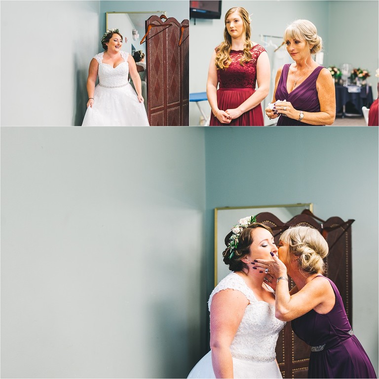 mother of the bride seeing daughter in wedding dress for the first time