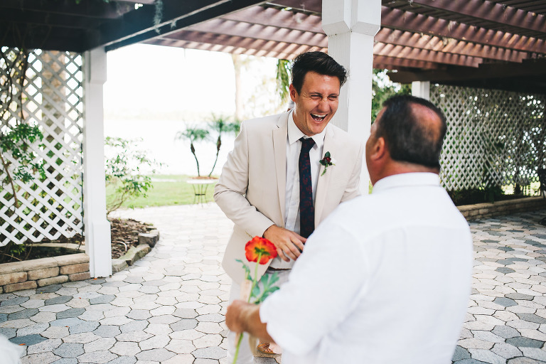 groom being thanked by father of the bride
