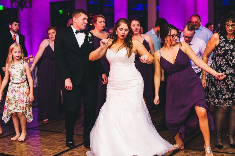 bride and groom dancing at bella collina reception