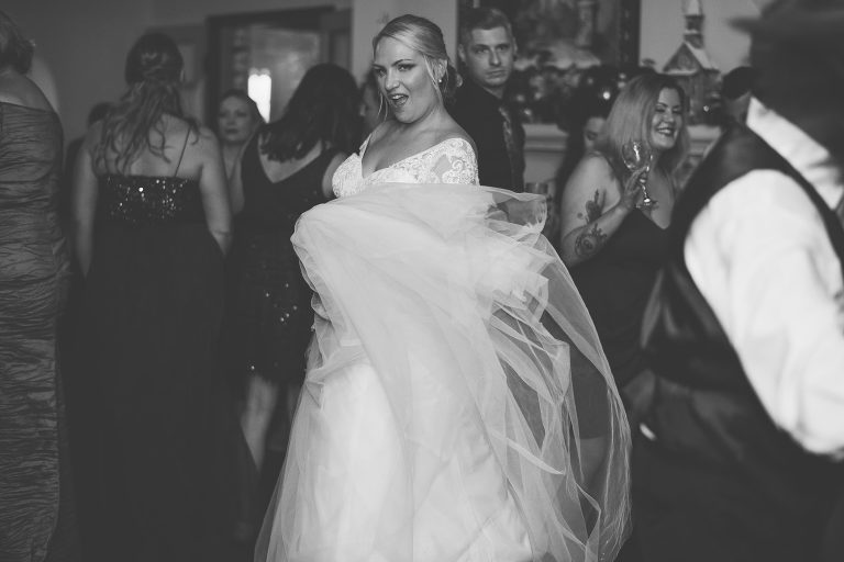bride twirling her dress