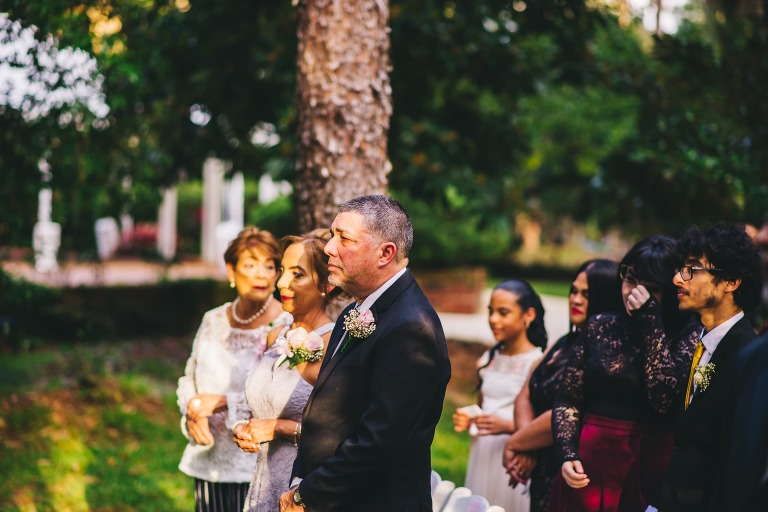 father of the groom getting emotional during wedding ceremony