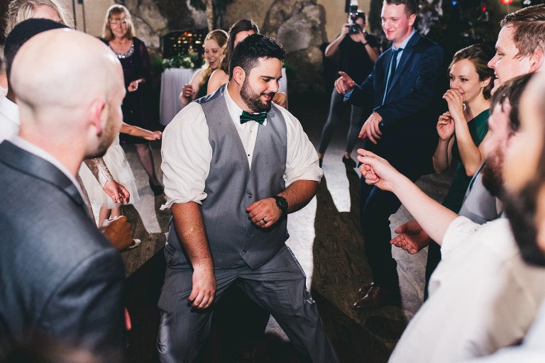 groom dancing during reception
