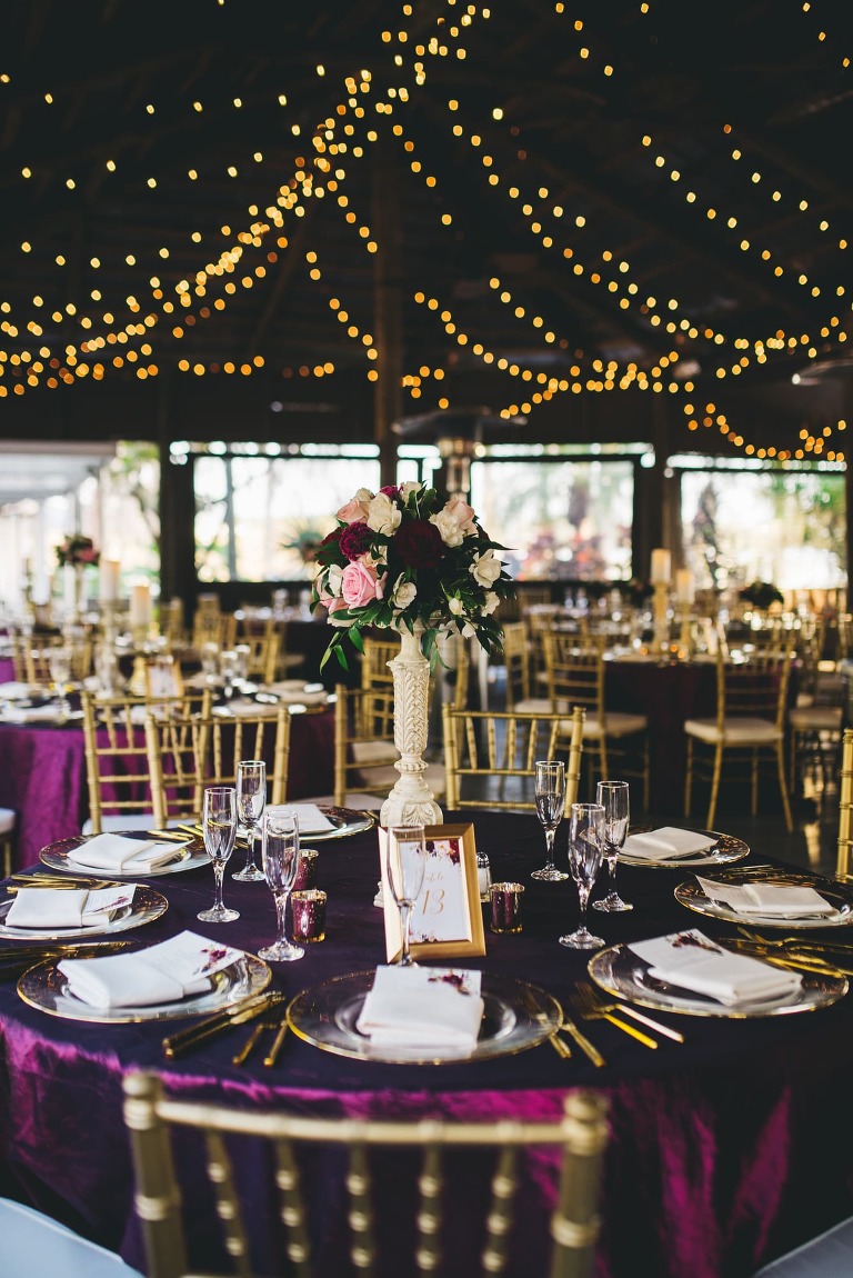 navy and burgundy floral centerpieces