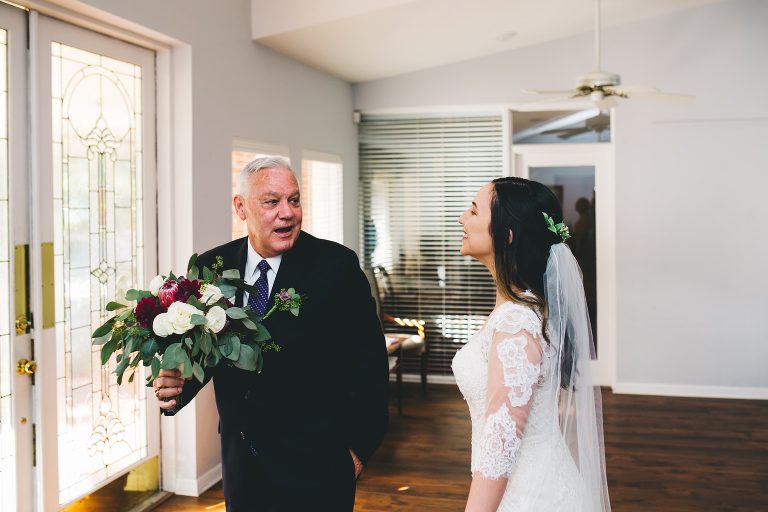 father of the bride seeing her daughter for the first time